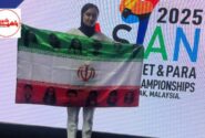 اقدام زیبای زهرا رحیمی که با یاد و پرچم منقش به کودکان شهید روی سکو رفت